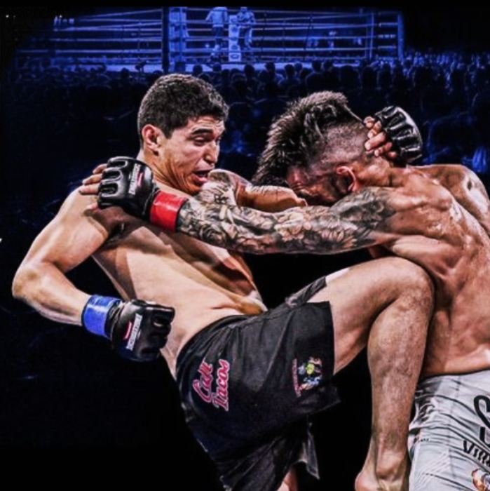 Coach Carlos competing in a professional mixed martial arts fight
